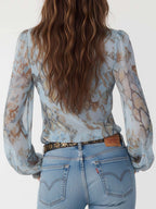 Bianca · Blusa Chiffon Estampada Azul con Volantes