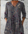 Margarita blusa larga gris floreado con bolsillos