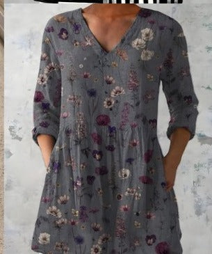 Margarita blusa larga gris floreado con bolsillos