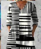 Paloma blusa larga rayas blanco y negro con bolsillos