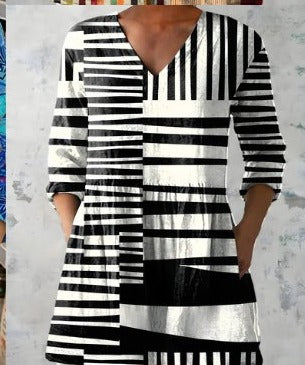 Paloma blusa larga rayas blanco y negro con bolsillos