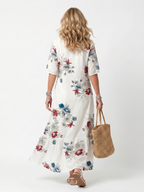 Malena · Vestido Midi Estampado Floral con Borlas