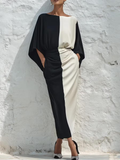 Two-piece set with a contrasting white and black top and midi skirt