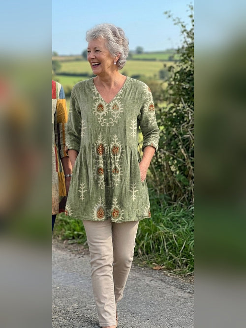 Adela blusa larga verde salvia con bolsillos