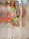 Rosalinda blusa larga floral acuarela con bolsillos