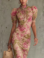 Fiora - Abito lungo con stampa vintage a rose e maniche a sbuffo.