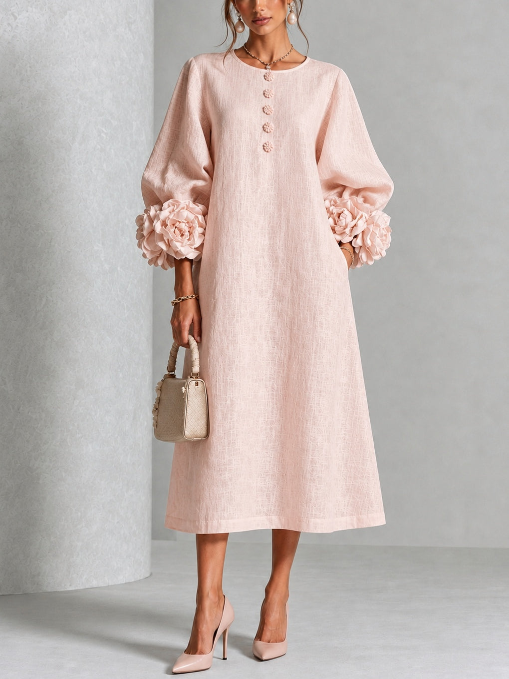 Rosaura vestido midi rosa puños de flor 3D - vista frontal