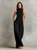Caterina · Vestido largo minimalista de cuello alto en negro